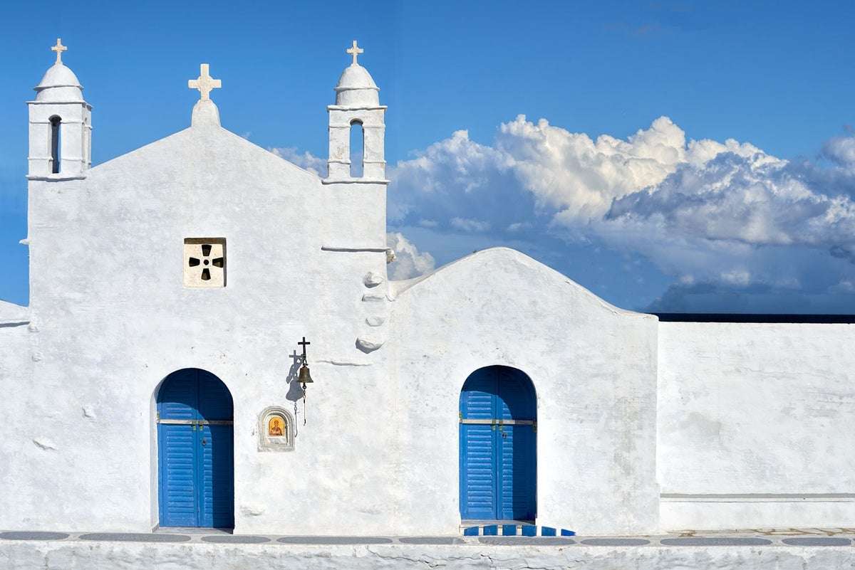 Agios Sostis Tinos grekiska ön pussel på nätet