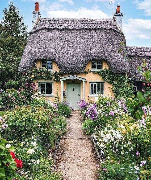 Cottage em flores quebra-cabeças online