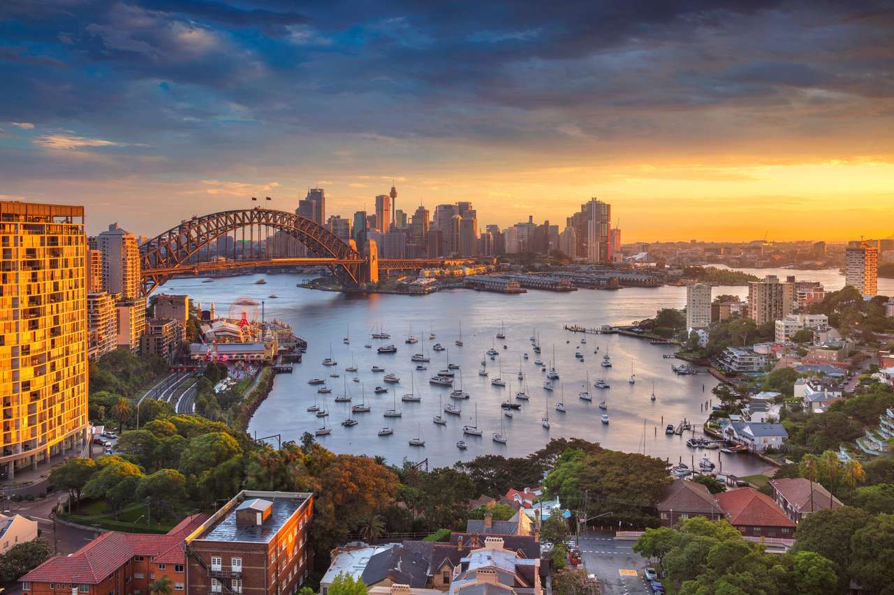 Sydney. Imagem da arquitectura da cidade de Sydney, Austrália com a ponte do porto e a skyline de Sydney durante o por do sol. quebra-cabeças online