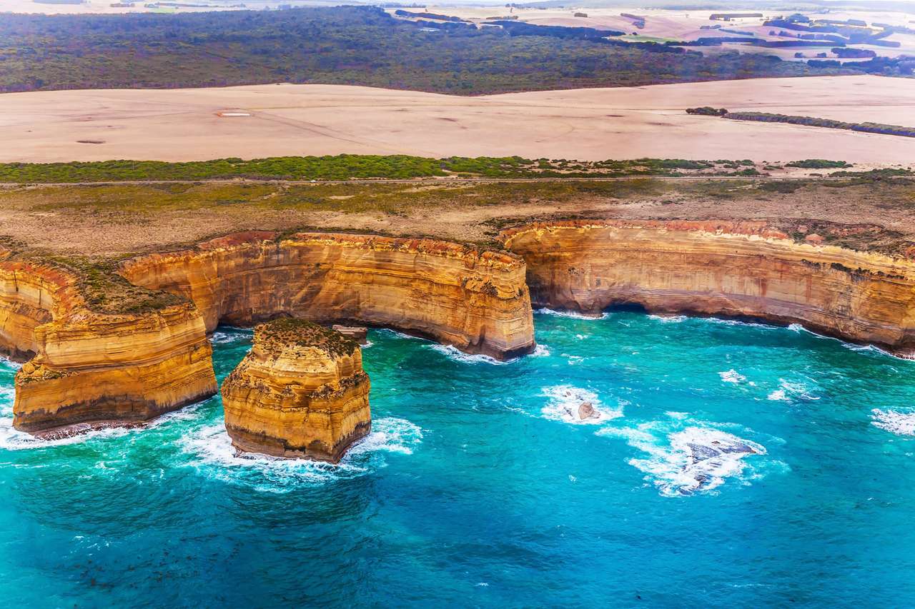 Australia, Port Campbell Park. The world-famous scenic spot on the ocean coast - The Twelve Apostles. Great Ocean Road. Helicopter flight. The concept of extreme, active and photo tourism online puzzle