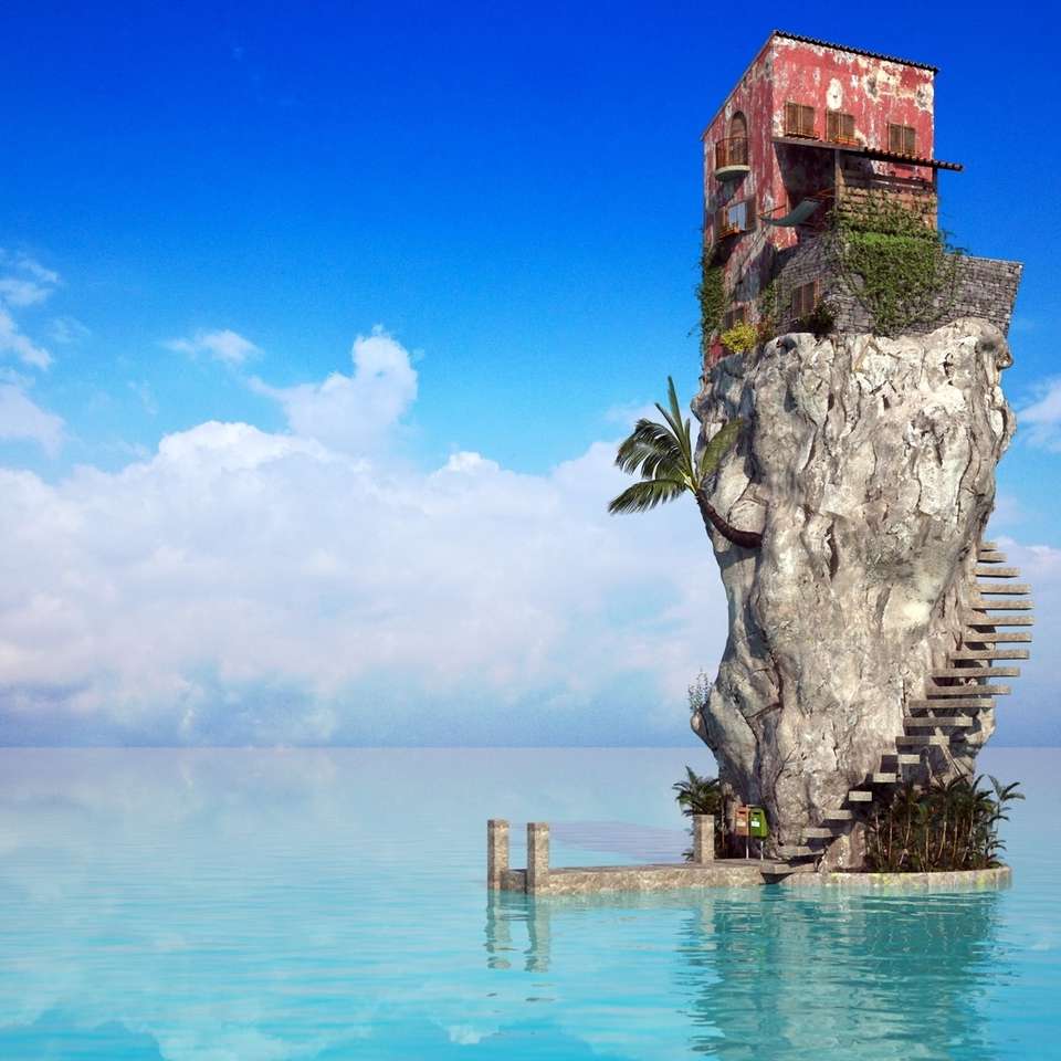 Haus auf dem Felsen in der Mitte des Meeres Puzzlespiel online