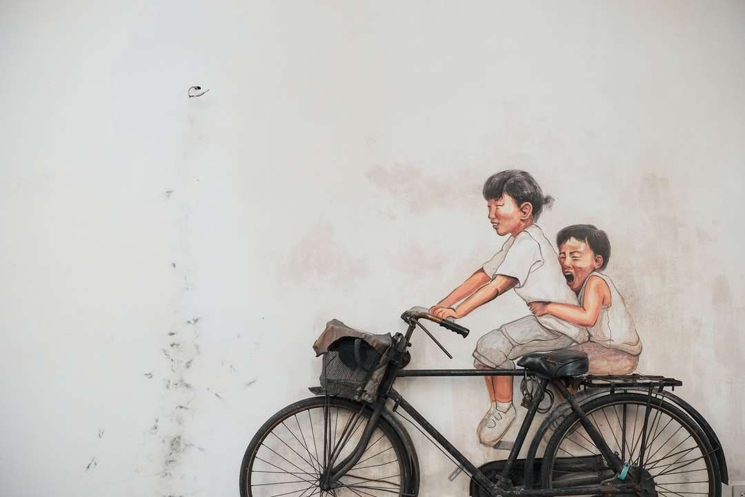 two children riding bicycle painting online puzzle