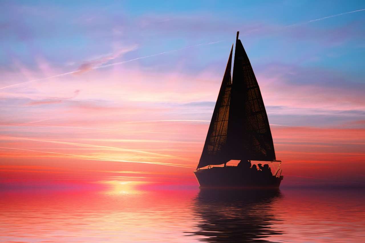 Navigando al tramonto sull'oceano puzzle online