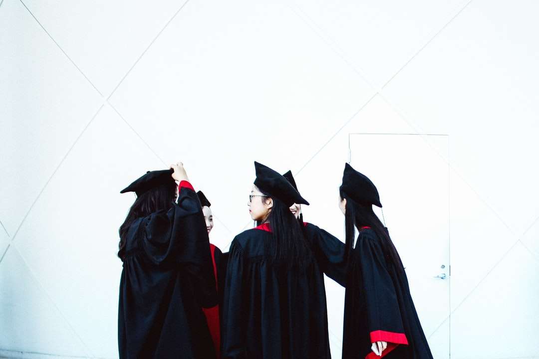 people in academic dress standing jigsaw puzzle online