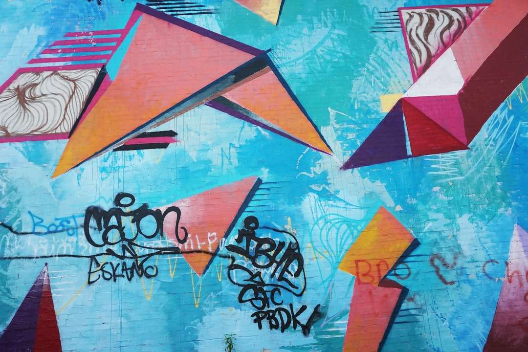 Blaue und mehrfarbige Wand voller Graffitis Puzzlespiel online