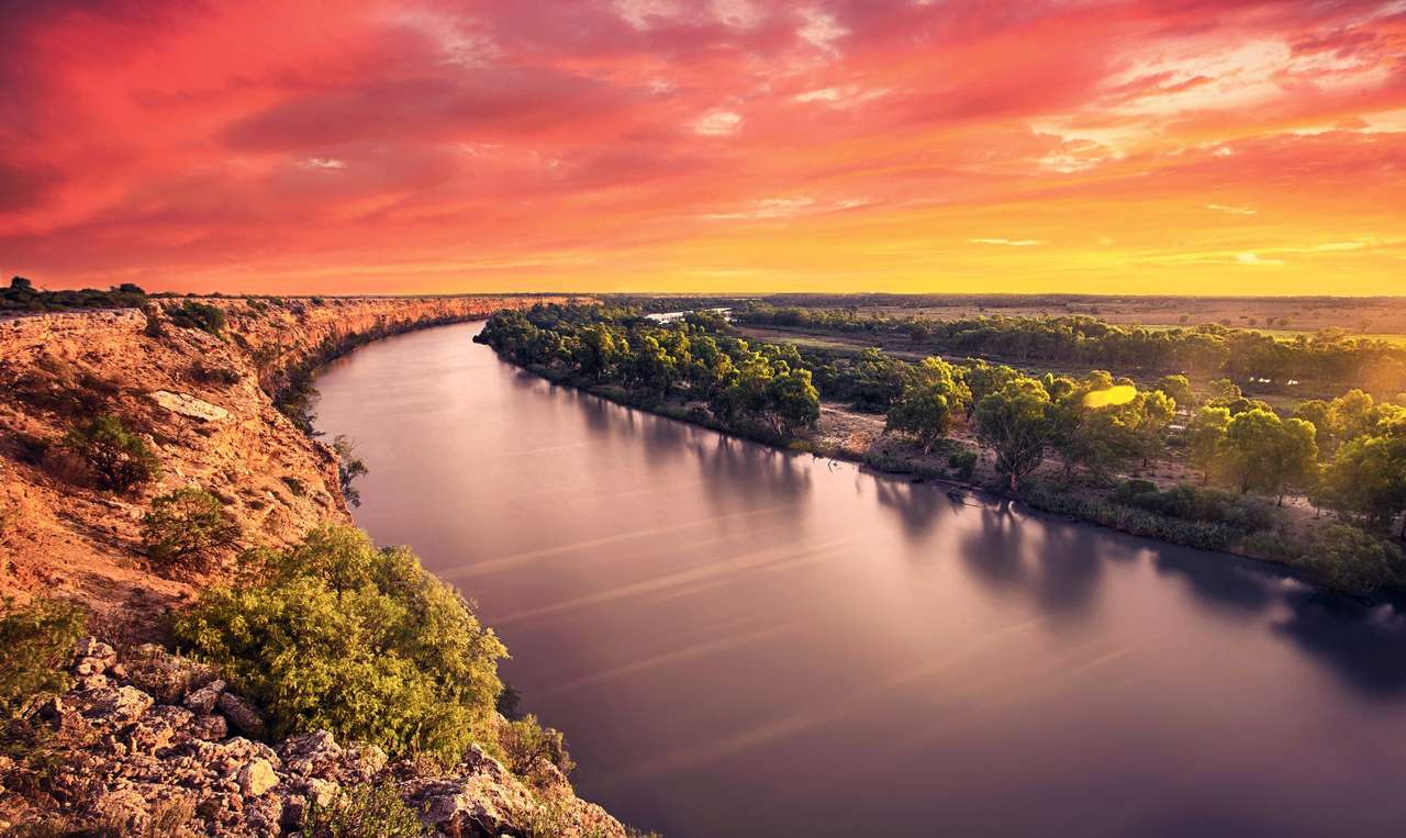 En fantastisk solnedgång på floden Murray Pussel online