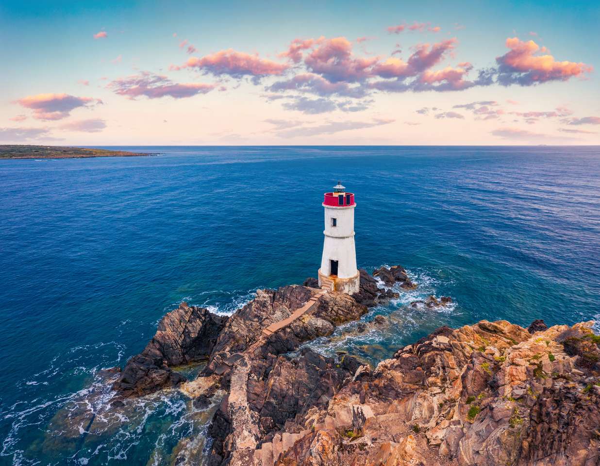 Vista pittoresca di Di Capo Ferro Lighthouse puzzle online