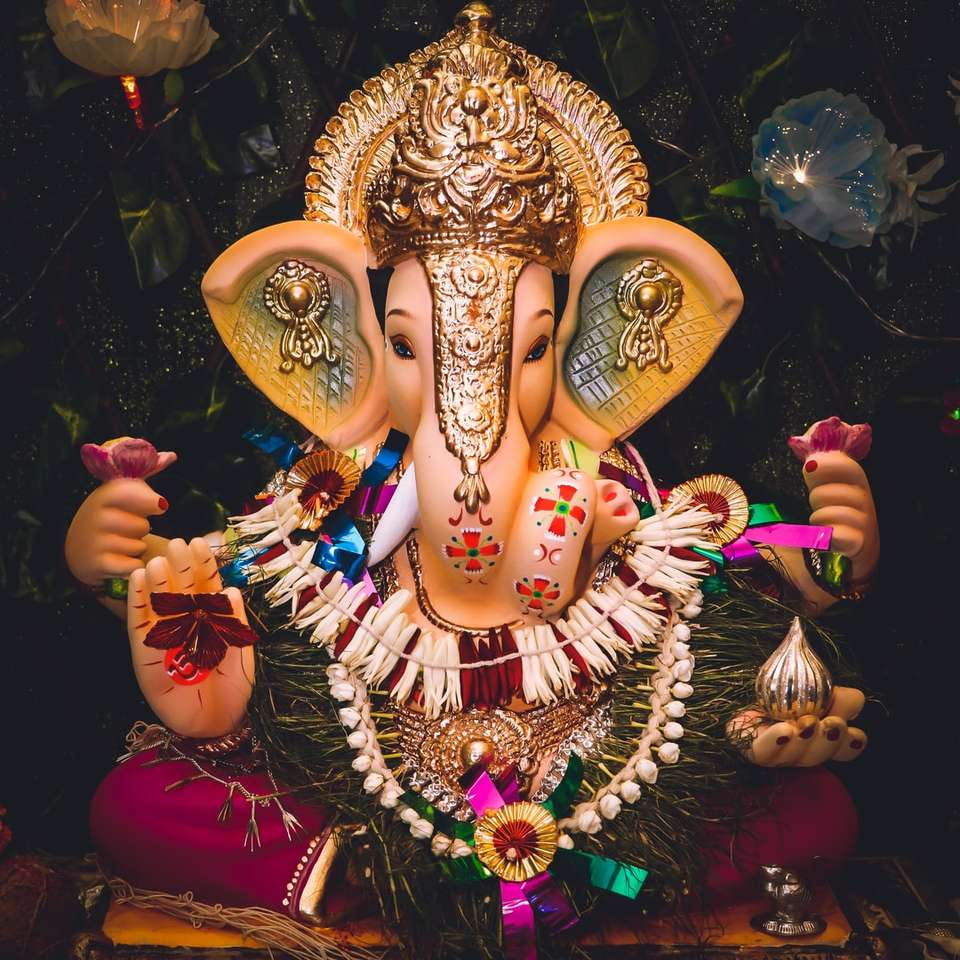 guld- och lila hinduistisk gudstjänstfigur pussel på nätet
