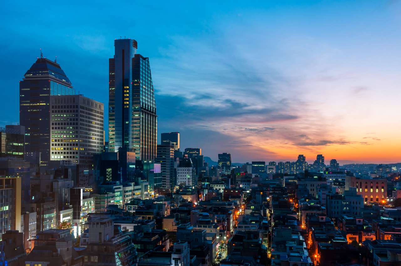 Il sole tramonta sul quartiere Gangnam di Seoul, Corea del Sud. puzzle online