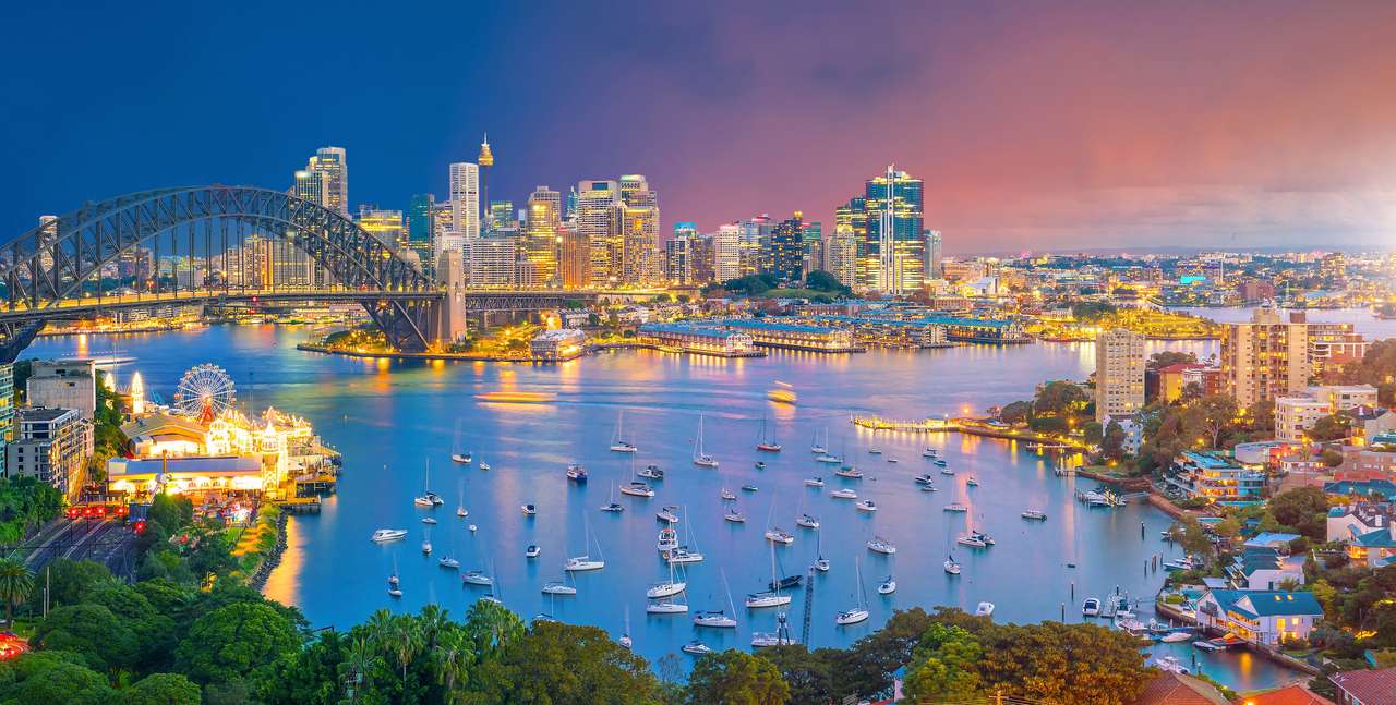 Skyline van de binnenstad van Sydney in Australië bij schemering online puzzel