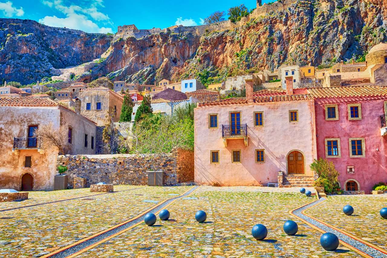 Square street view with old houses in Monemvasia jigsaw puzzle online