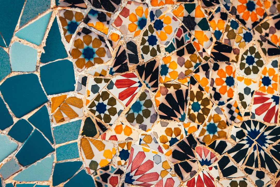 blue orange and white floral textile jigsaw puzzle online