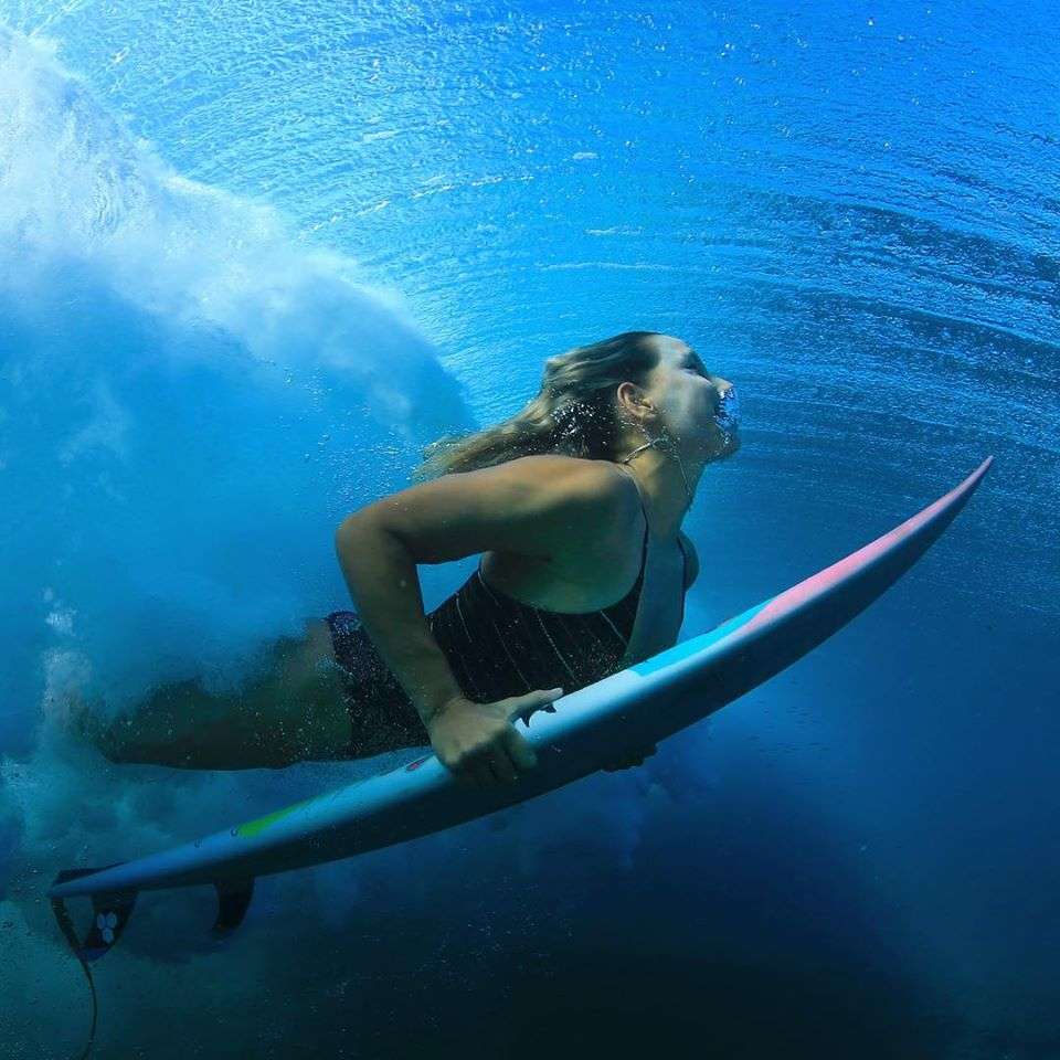 surfer à natua puzzle en ligne