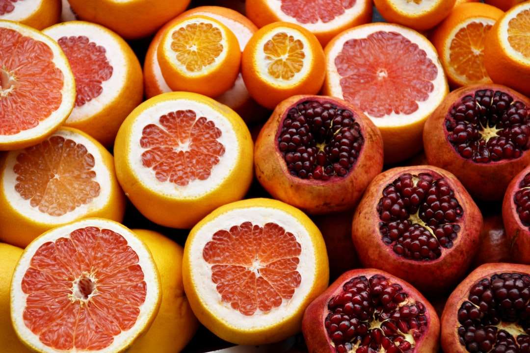 Granatapfel und Orangenfrüchte Puzzlespiel online