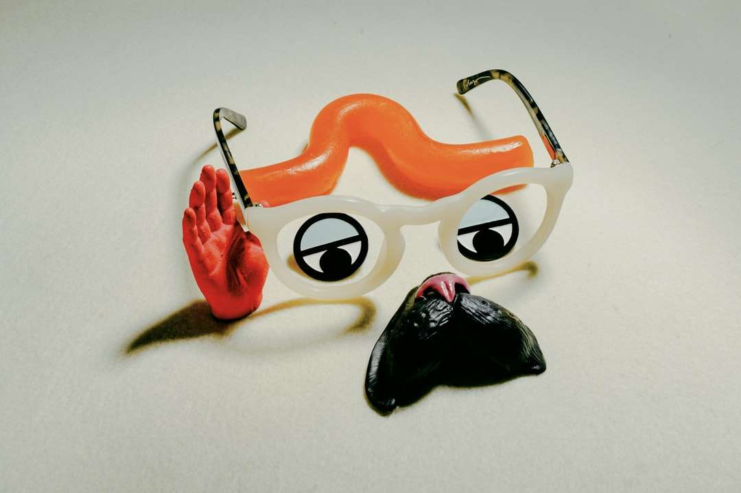 juguete de plástico gato naranja y negro rompecabezas en línea