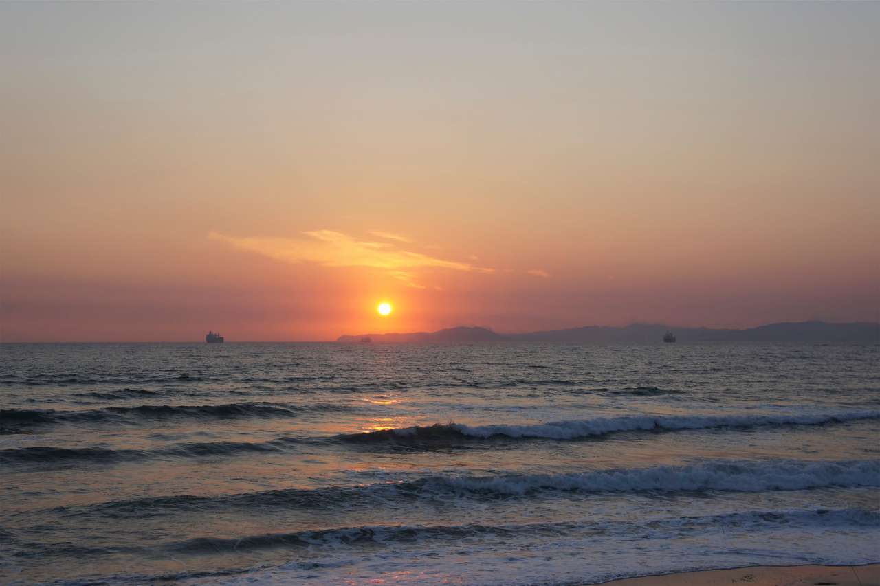 Seascape med solnedgången Pussel online