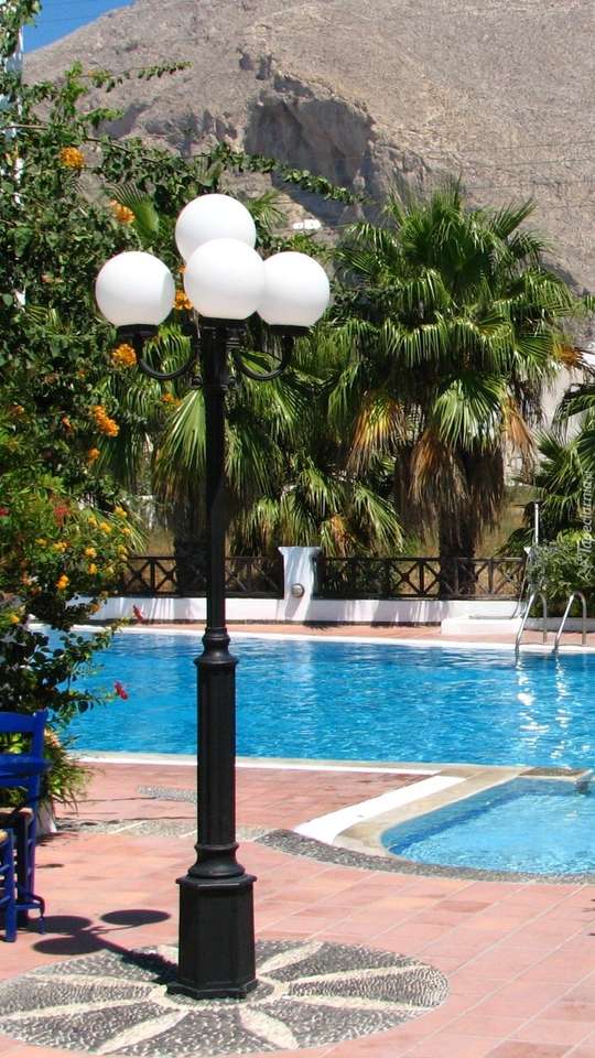 Lantern next to the pool jigsaw puzzle online