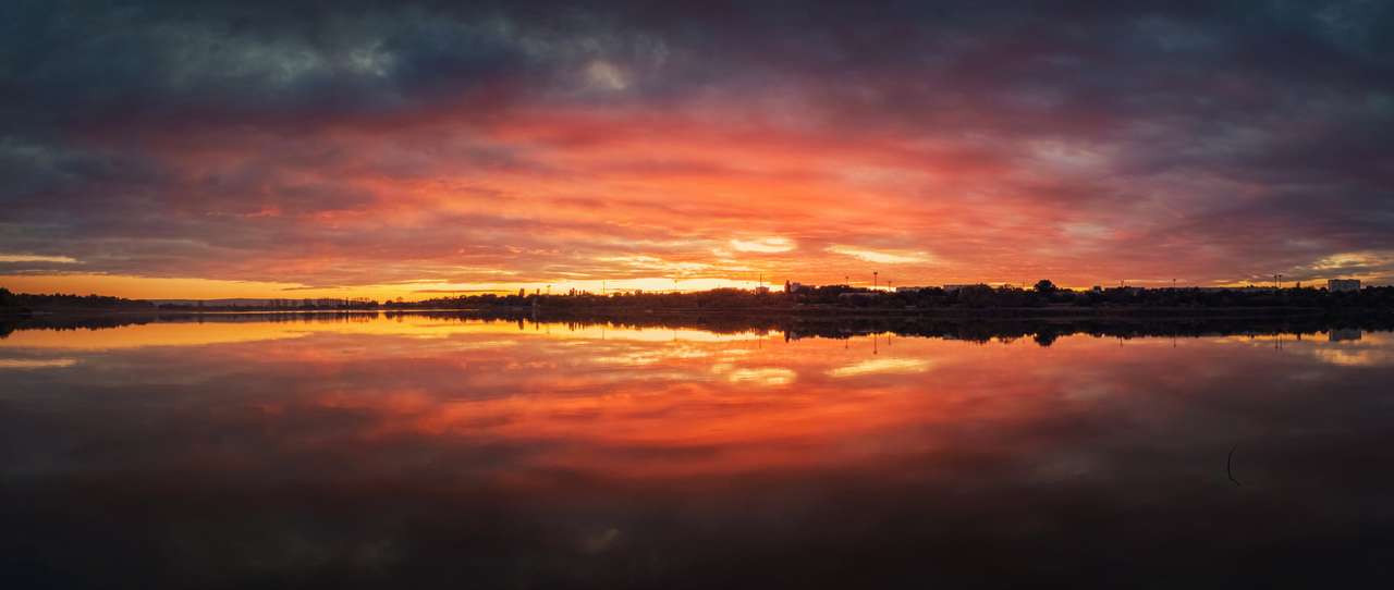 Audace panorama al tramonto sul lago Delia, Moldavia puzzle online