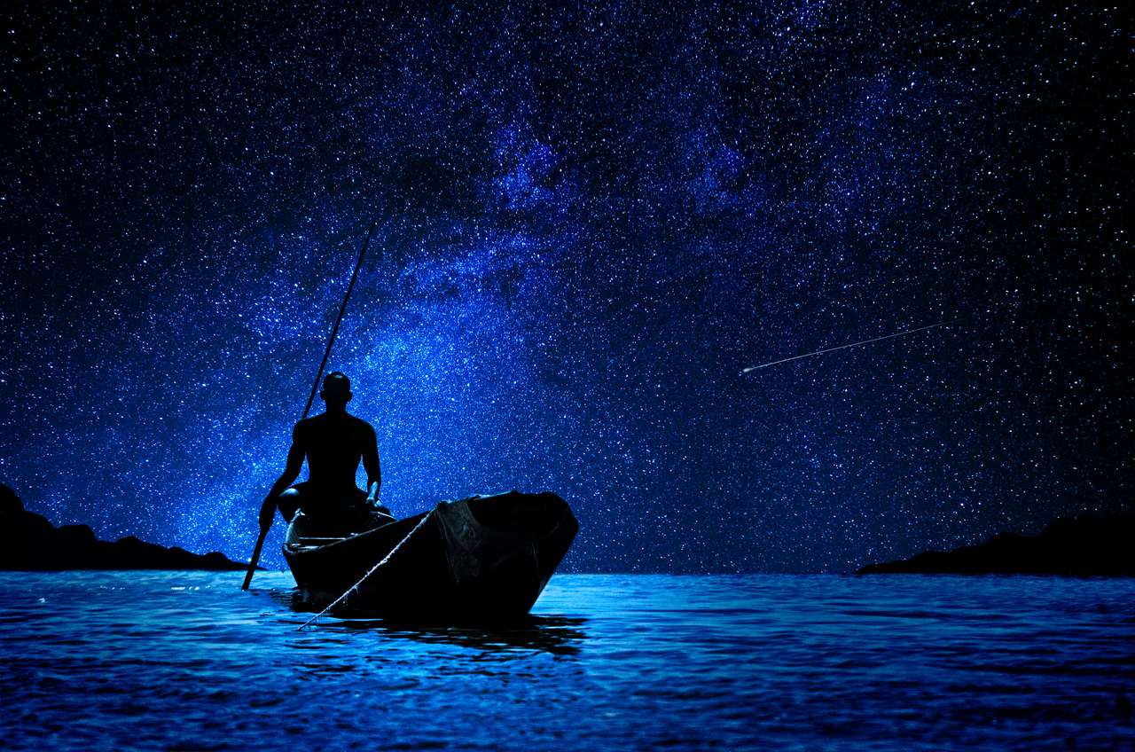 Afrikansk båtman med sin kanot framför stjärnorna pussel på nätet