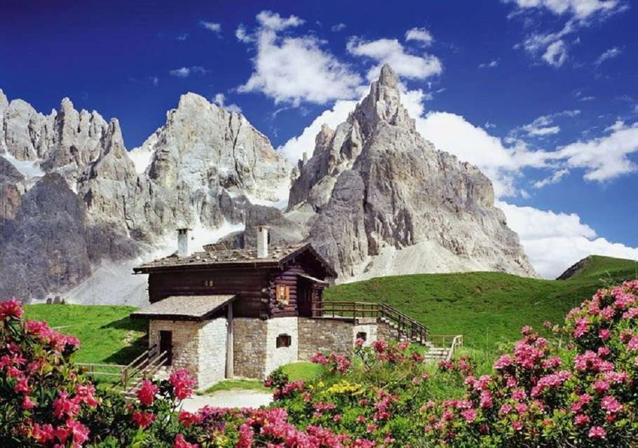 Maison dans les Dolomites dans les montagnes italiennes puzzle en ligne