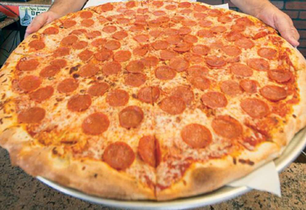 Una pizza gigante❤❤❤❤❤ rompecabezas en línea