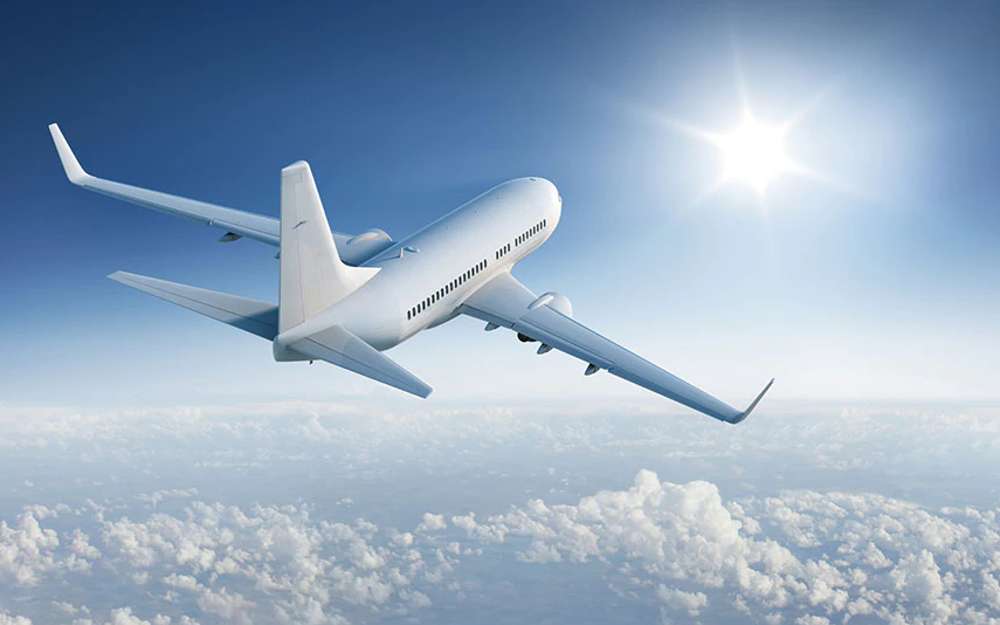 Λευκό αεροπλάνο στον ουρανό παζλ online