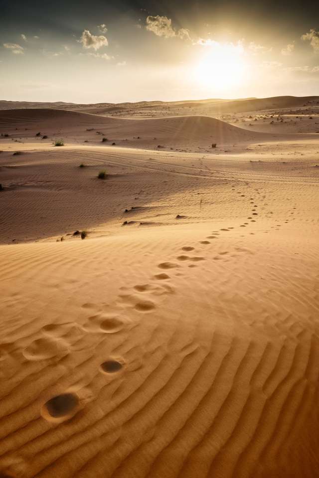 Zonsondergang in woestijn Wahiba in Oman legpuzzel online