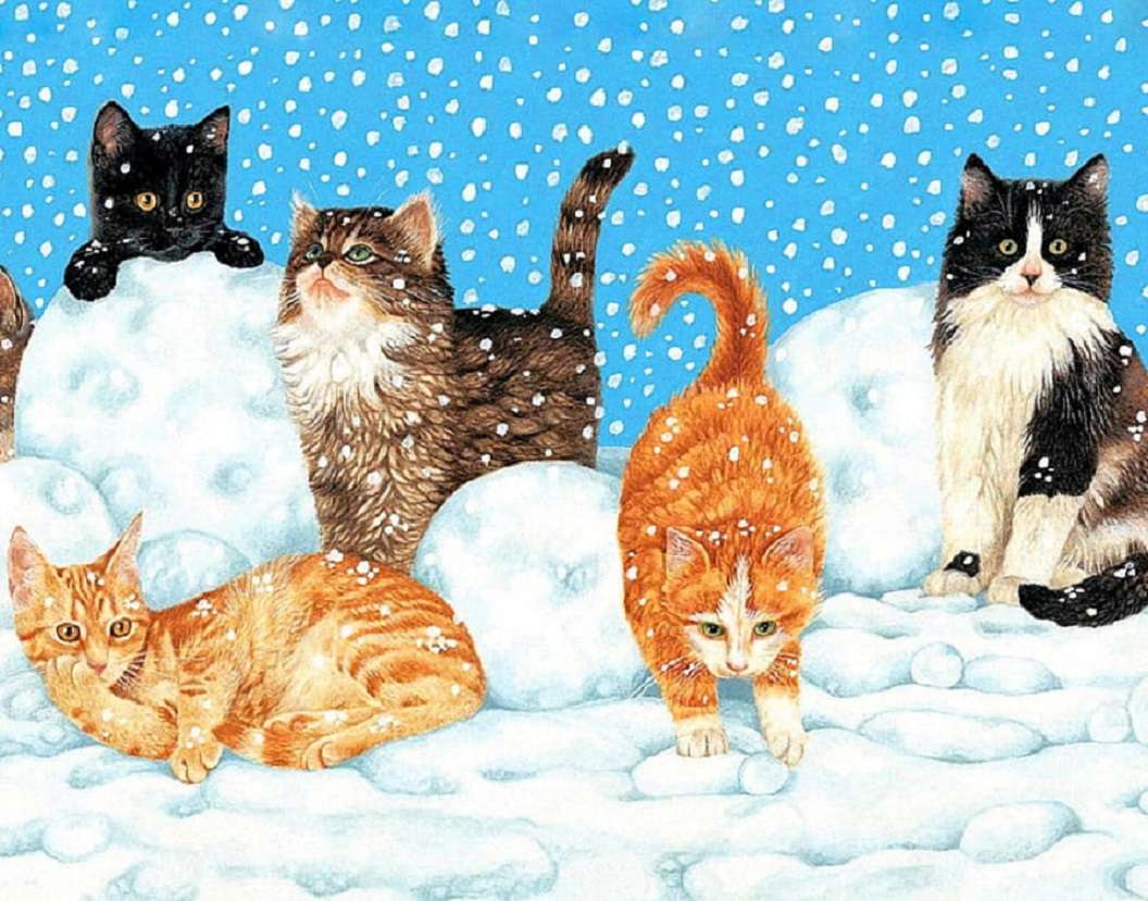 Lekfulla kattdjur i snön Pussel online