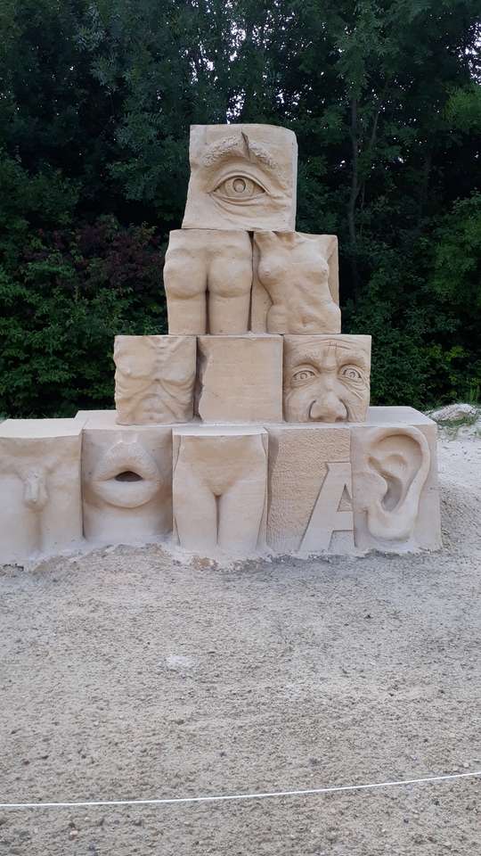 Sandskulptur pussel på nätet