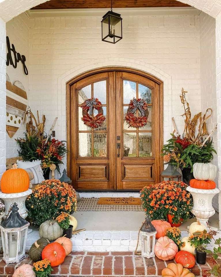 Autumn decoration in front of a house jigsaw puzzle online
