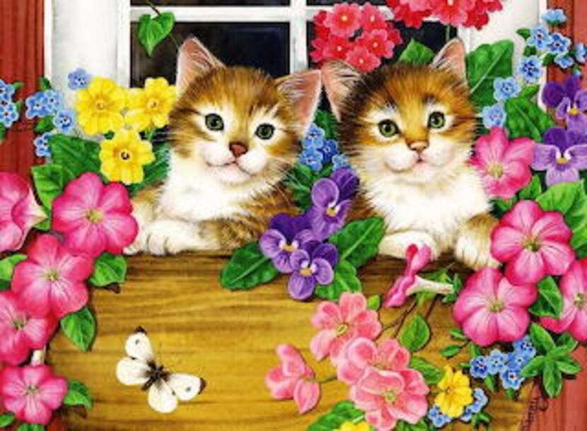 Zwei schöne Kätzchen unter Blumen Online-Puzzle