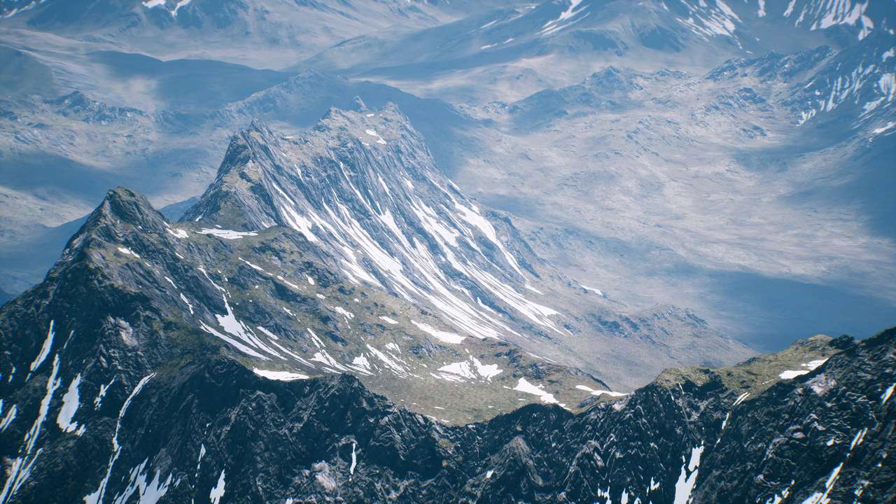 Vue aérienne paysage de montagnes couvertes de neige puzzle en ligne