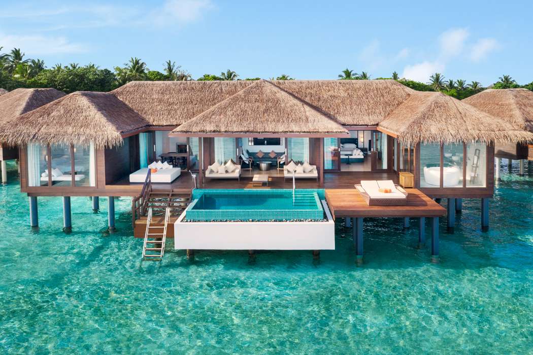 Ett fritidshus vid vattnet på Maldiverna pussel på nätet