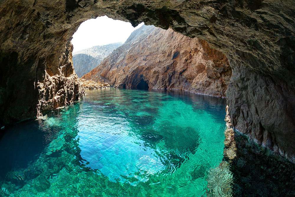 Grekiska ön Mykonos Tragonisi Caves Pussel online