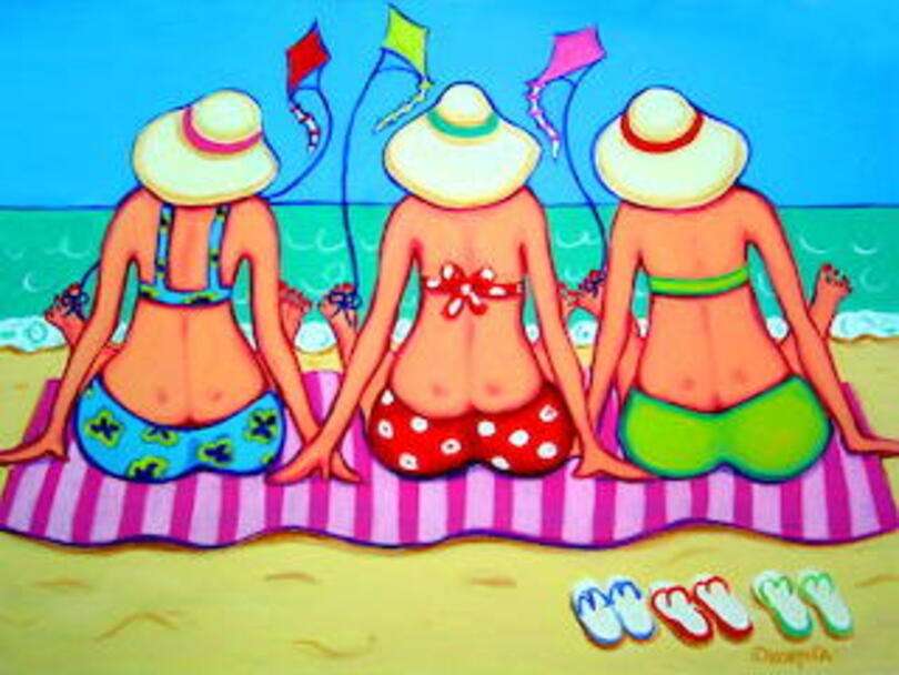 Damer njuter av stranden pussel på nätet