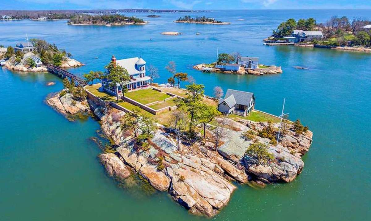 Uma casa na ilha privada de um anão americano puzzle online