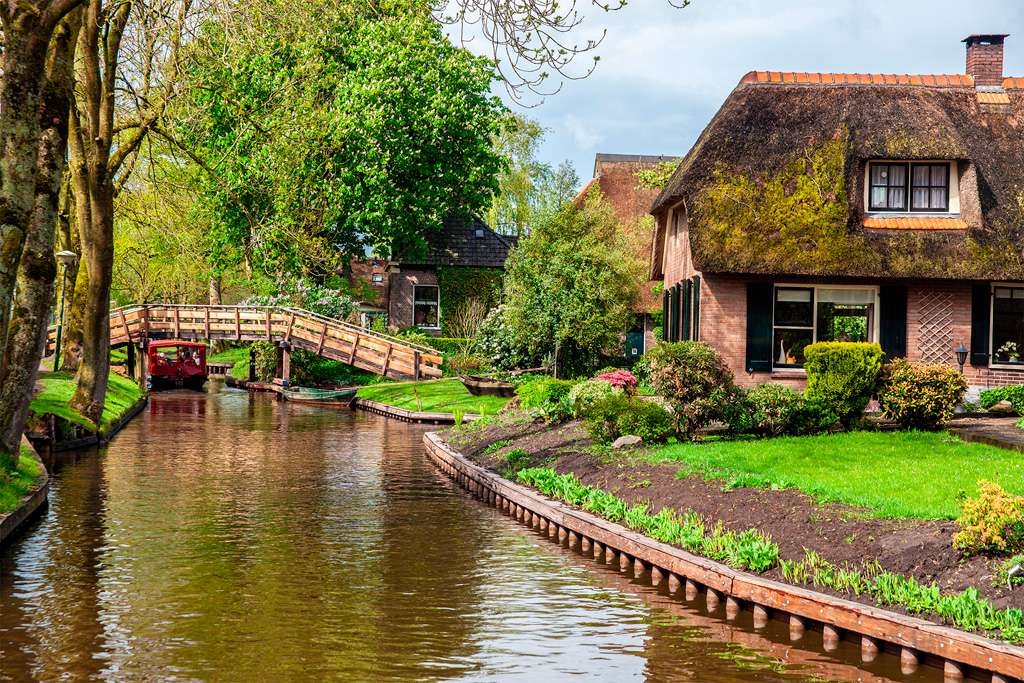 Niederlande-Giethoorn-Häuser auf dem Wasser Puzzlespiel online