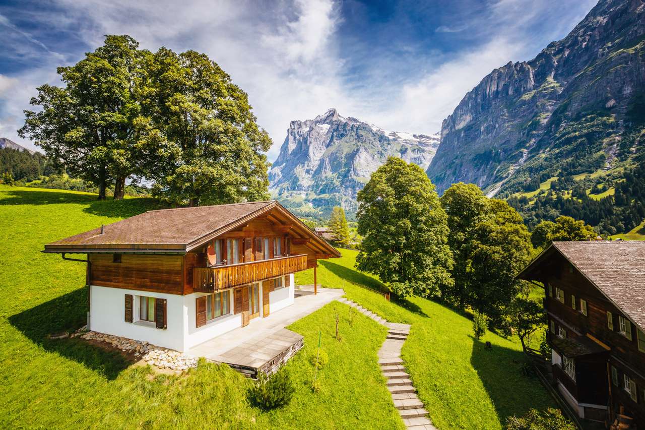 Vista impressionante da aldeia alpina de Eiger quebra-cabeças online