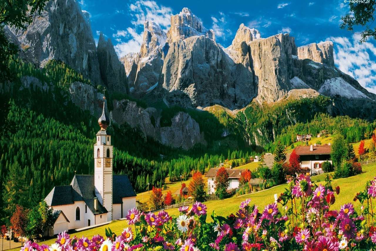 Église dans les montagnes en été puzzle en ligne