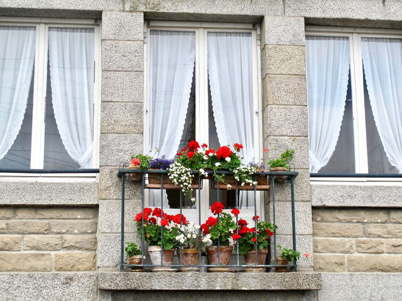 Geraniums op het balkon online puzzel