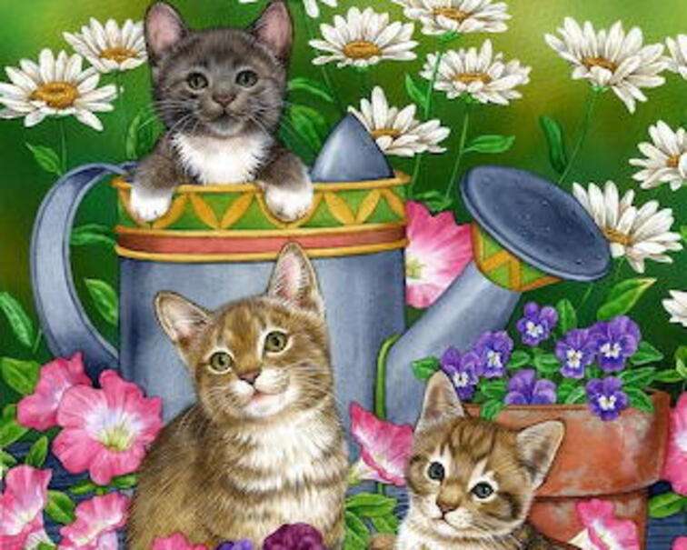 Drie kittens tussen bloemen legpuzzel online