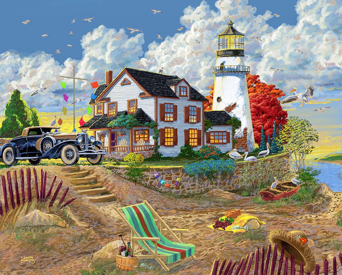 A lighthouse and a house by the sea jigsaw puzzle online
