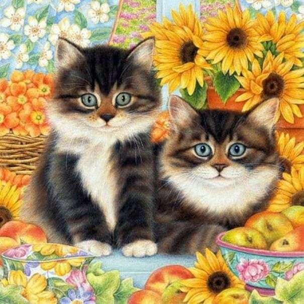 Красиви котенца, заобиколени от слънчогледи онлайн пъзел