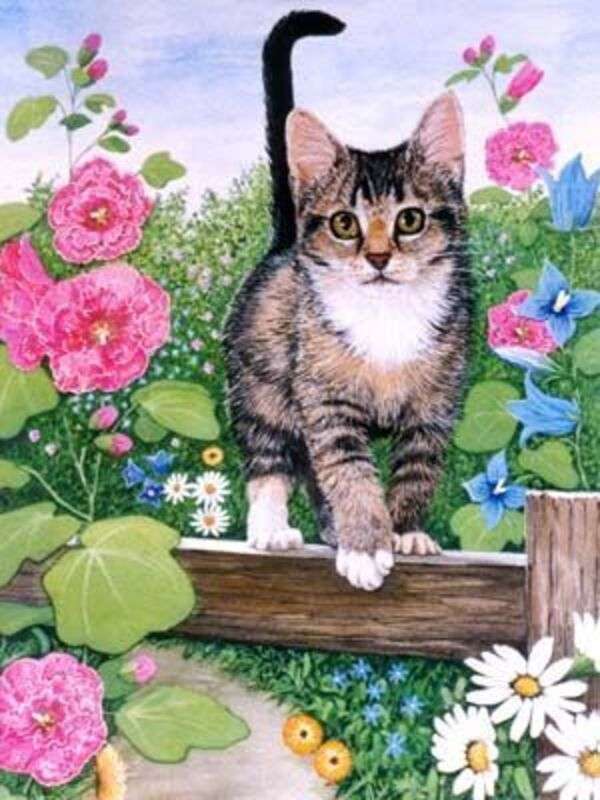Kattunge i trädgården bland blommor pussel på nätet