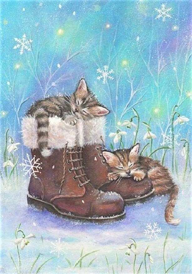 Chatounets in laarzen onder de sneeuw legpuzzel online