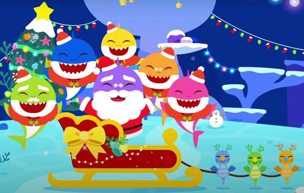 Familia de tiburones con Papá Noel rompecabezas en línea