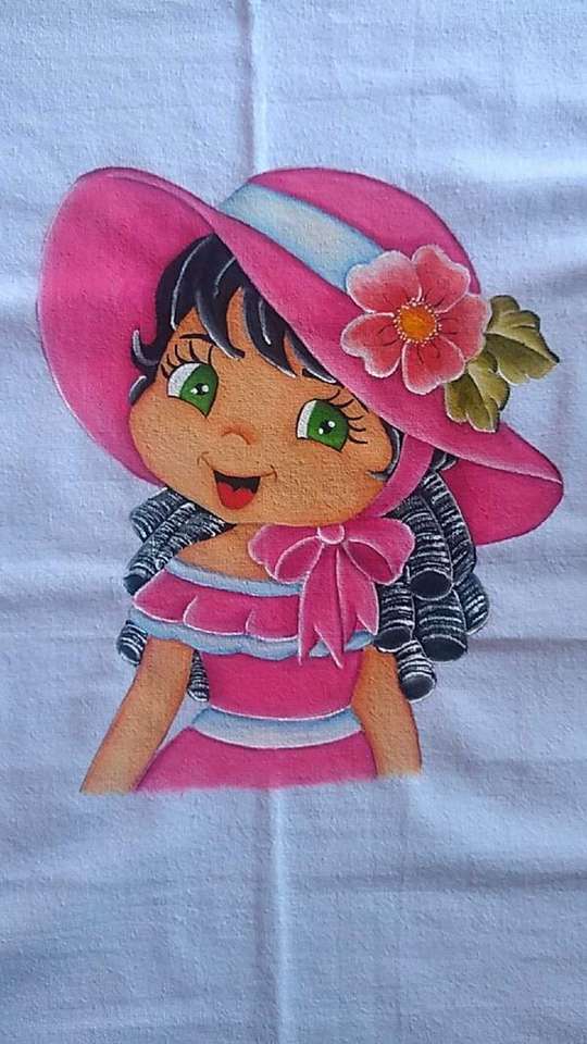 Colochos girl with pink dress and hat online puzzle