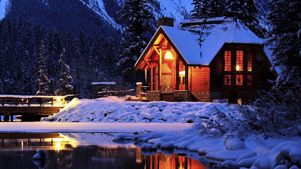 Casa de invierno frente al lago rompecabezas en línea