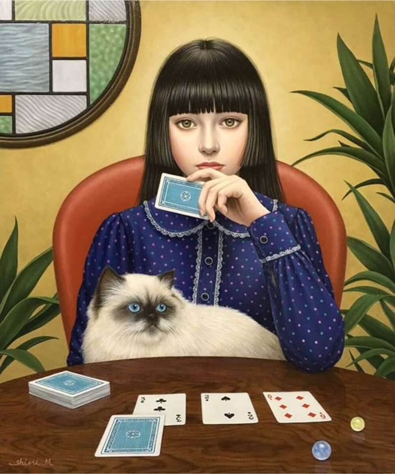 niña jugando a las cartas rompecabezas en línea