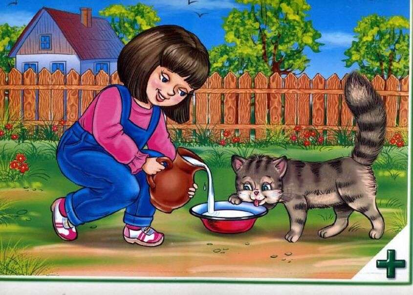 Vacker liten flicka ger mjölk till kattungen pussel på nätet